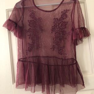 Sheer maroon blouse with beautiful detailing.